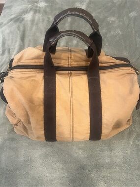Fossil Canvas Duffel Bag in Tan with Dark Brown Straps